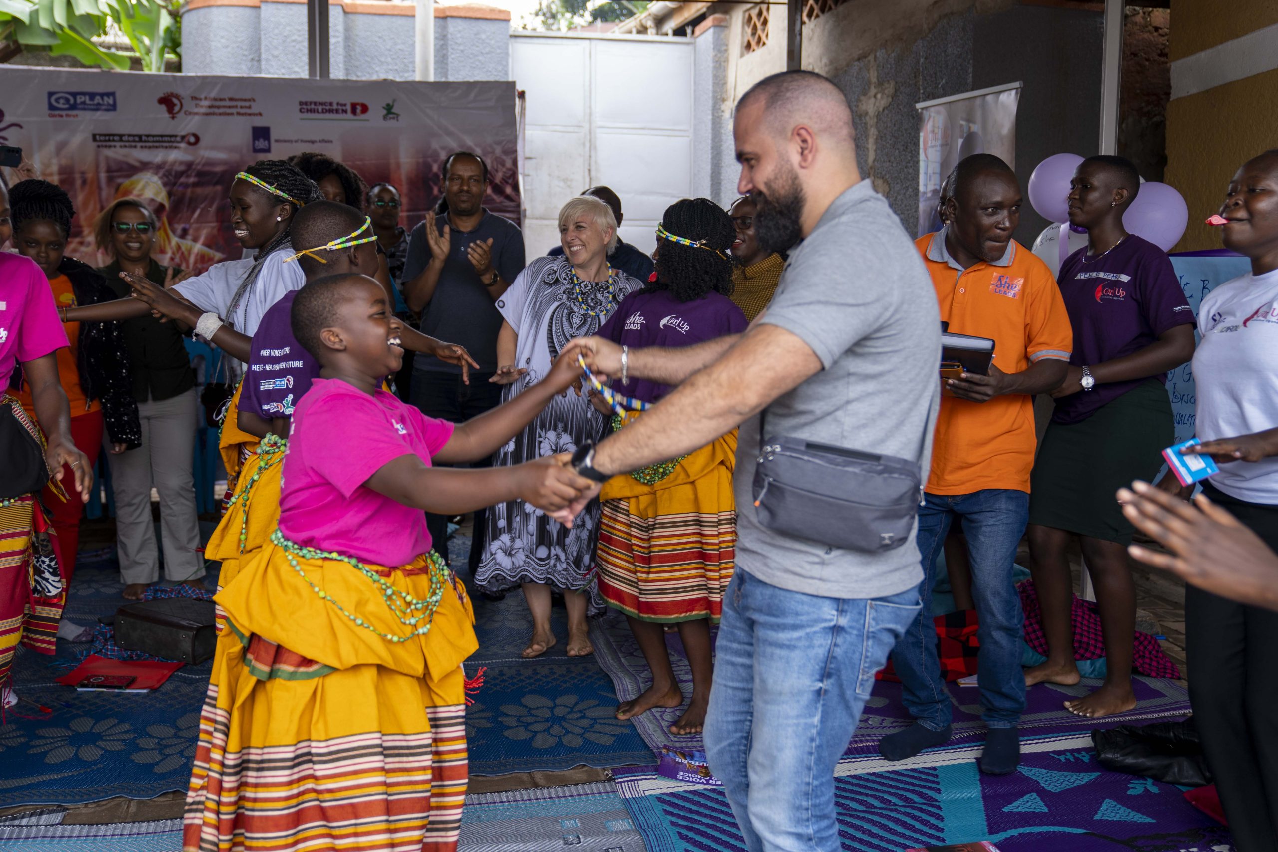 Girl and Man Dancing on She Leads event
