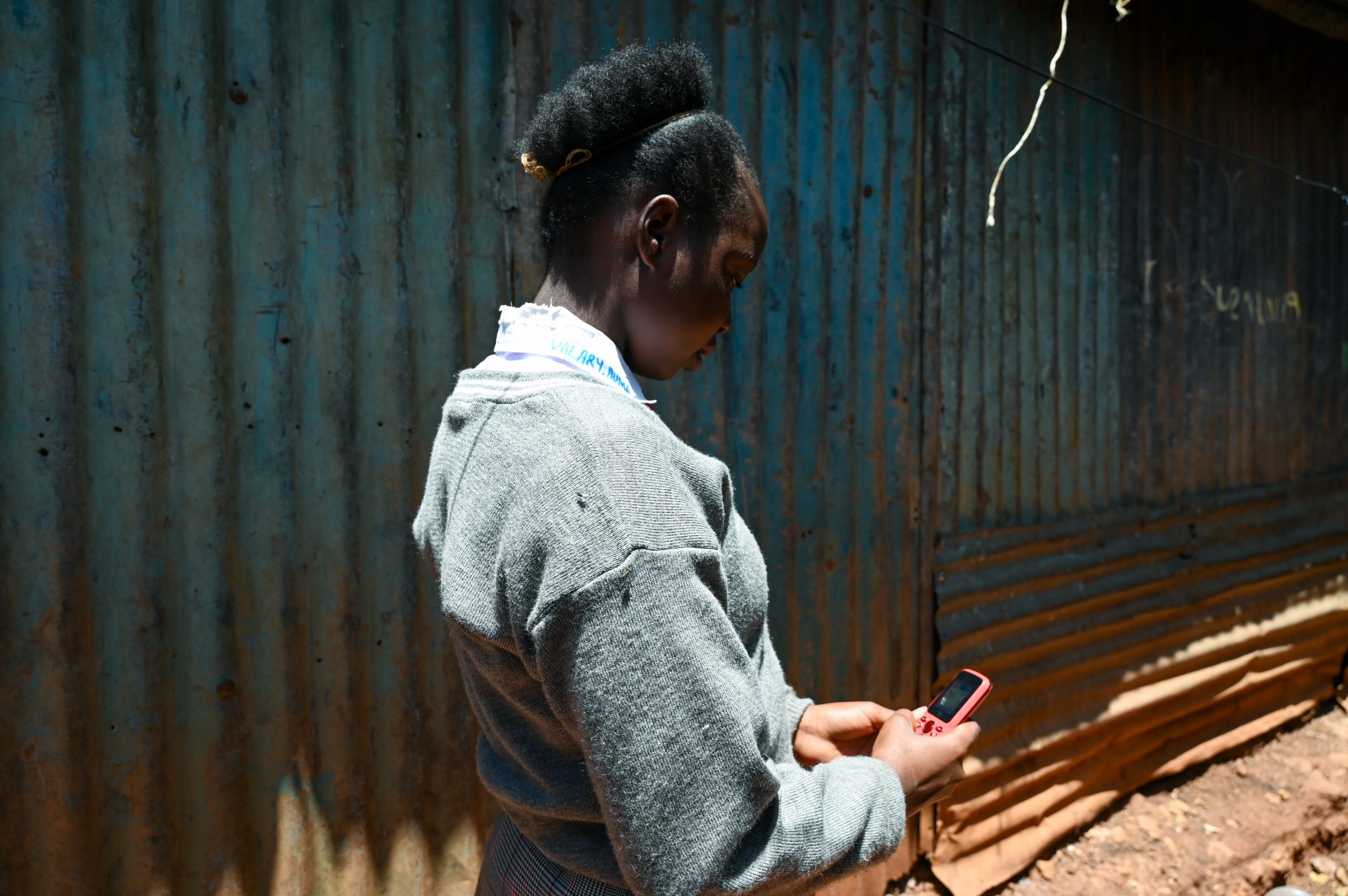 Bianca*, 13 years old, a project participant of the SCROL programme in Nairobi, Kenya, photographed using a mobile phone. Photo credit: Terre des Hommes Netherlands.
