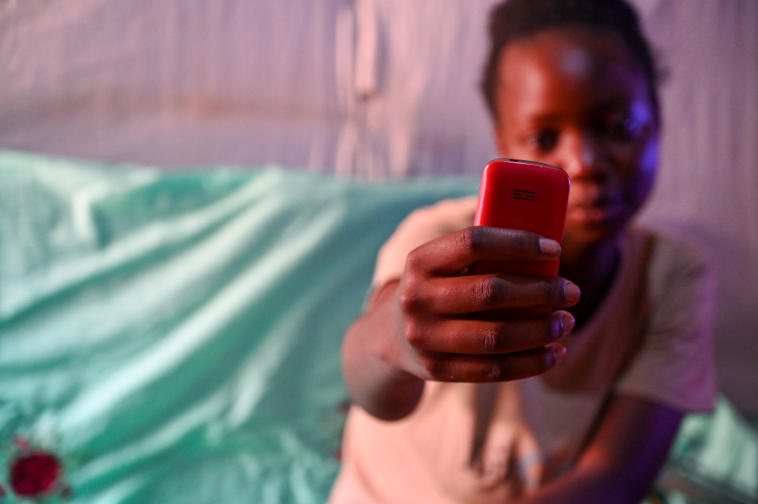 Bianca*, 13 years old, a project participant of the SCROL programme in Nairobi, Kenya, photographed using a mobile phone. Photo credit: Terre des Hommes Netherlands.