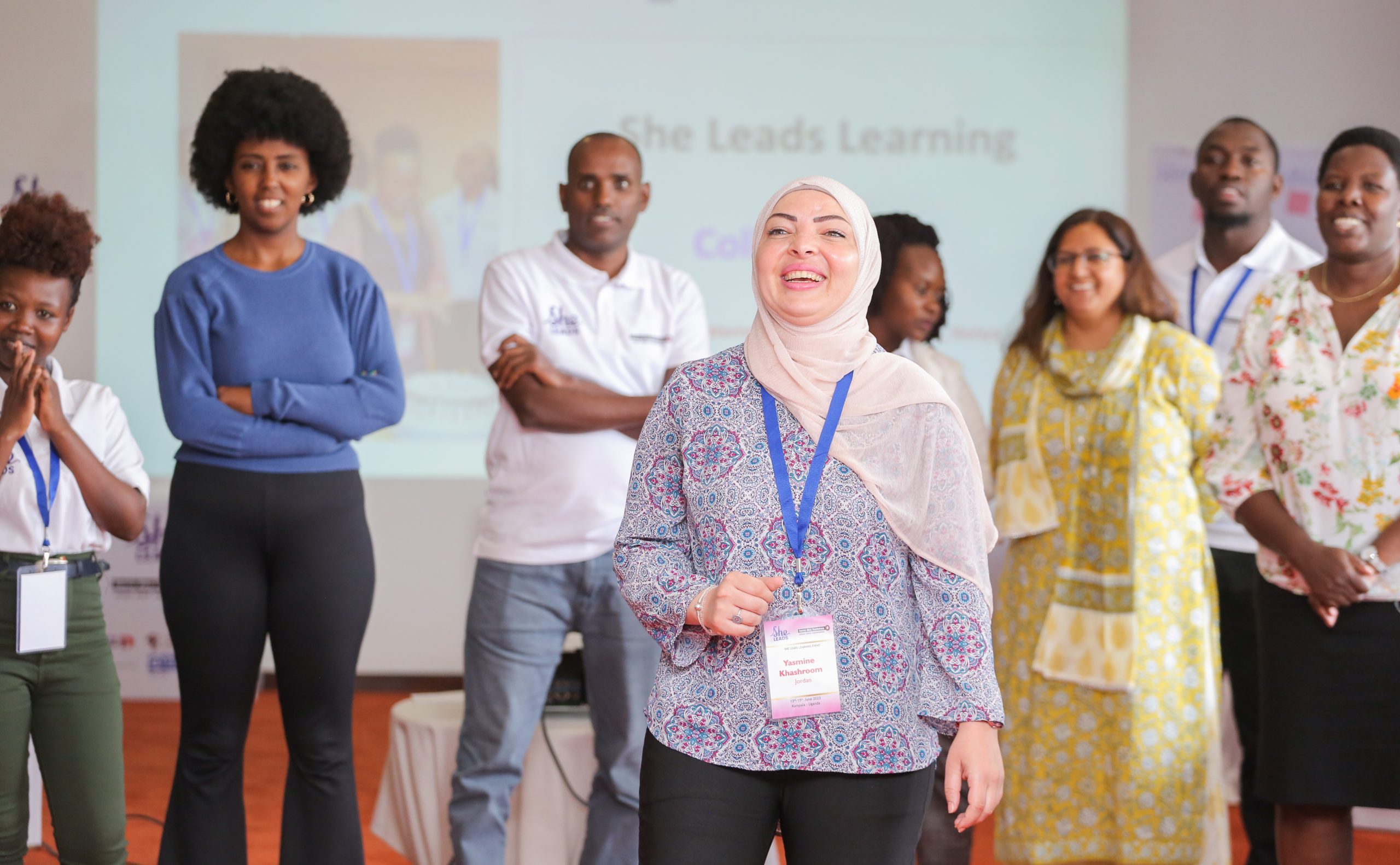 Woman laughing on She Leads Learning event