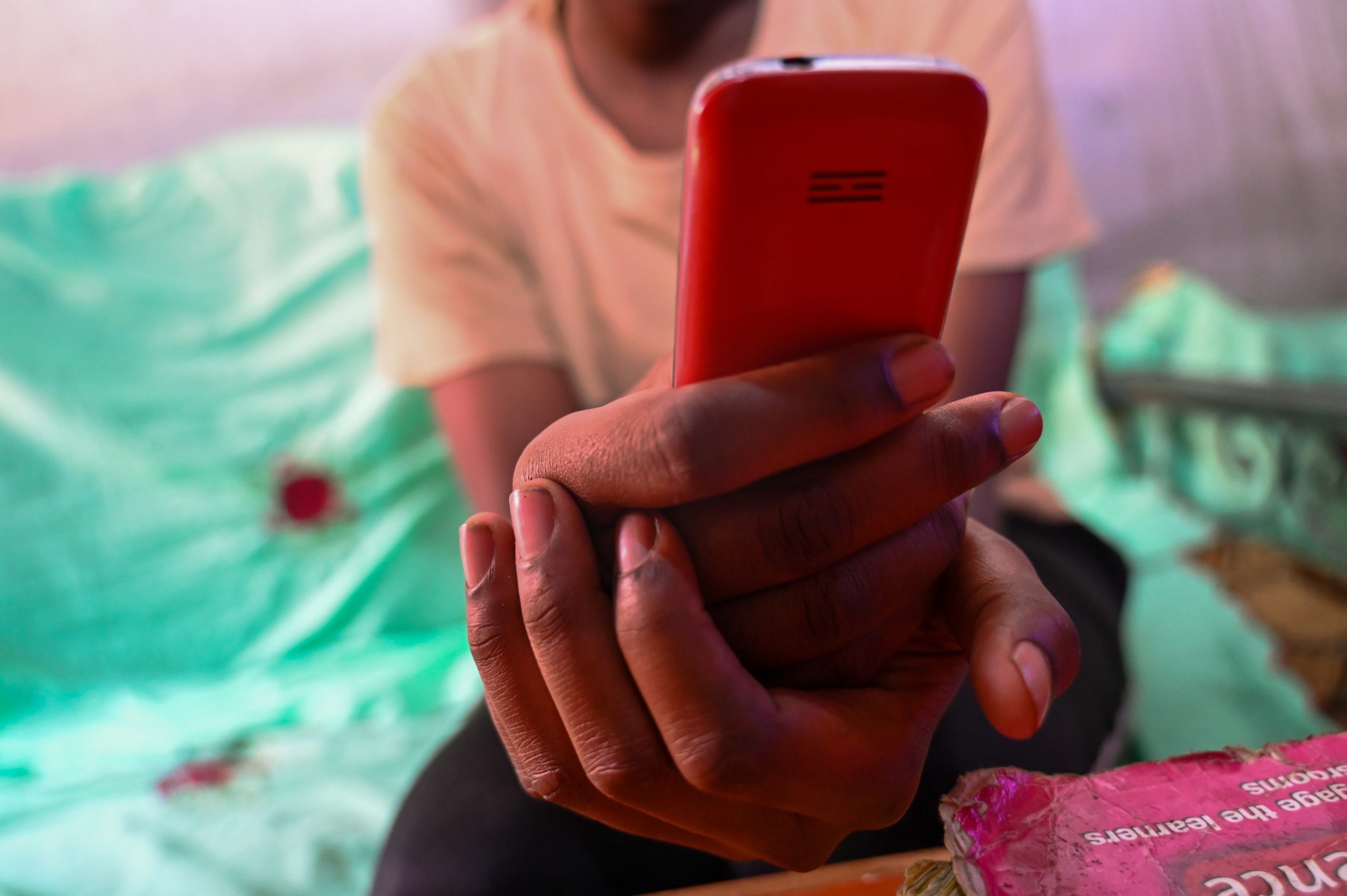 Bianca*, 13 years old, a project participant of the SCROL programme in Nairobi, Kenya, photographed using a mobile phone. Photo credit: Terre des Hommes Netherlands.