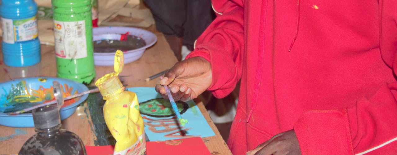 Kaunda at an art session in an art hub in Majengo